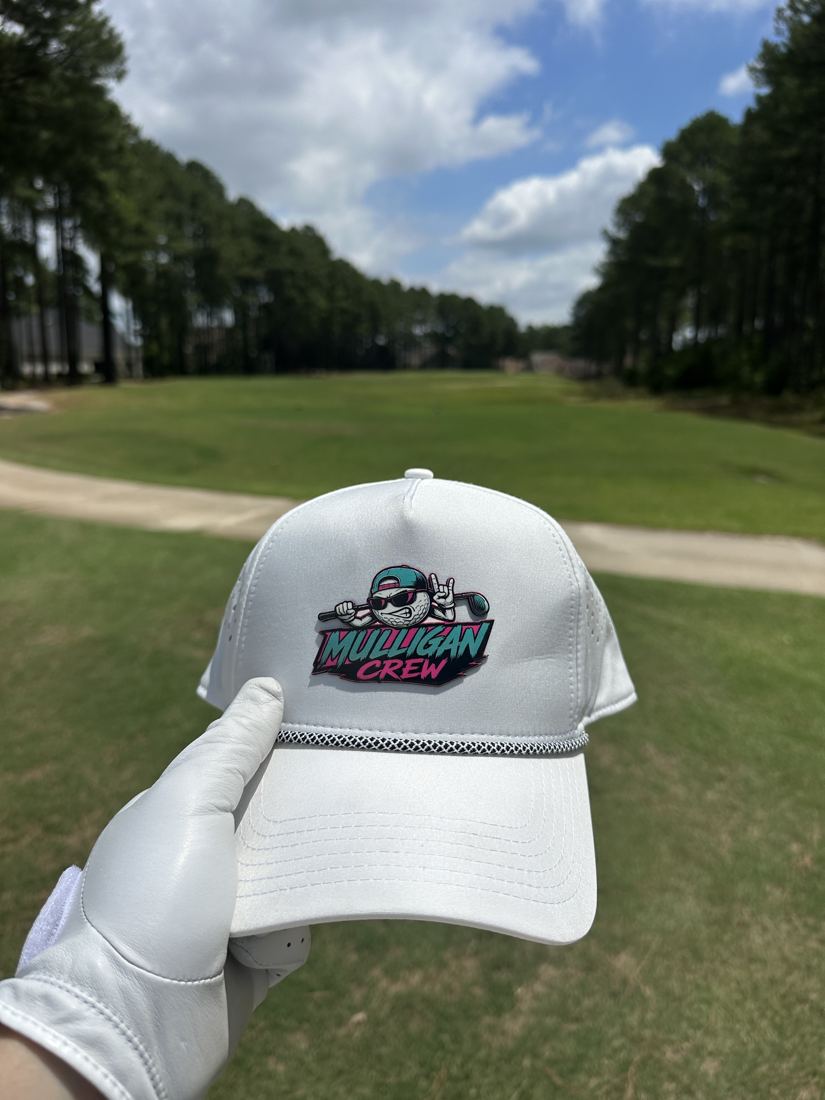 The Crew Hat, white with rope, held up on the fairway